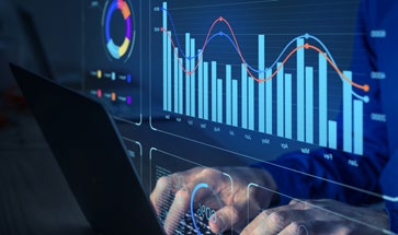 Image of a person working on a graph on a computer