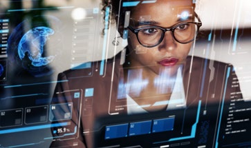 Image of a young lady working on a laptop